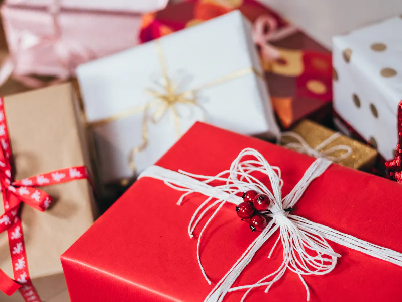 Wrapped presents arranged for a holiday gathering
