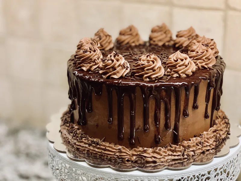 A chocolate celebration cake on a stand